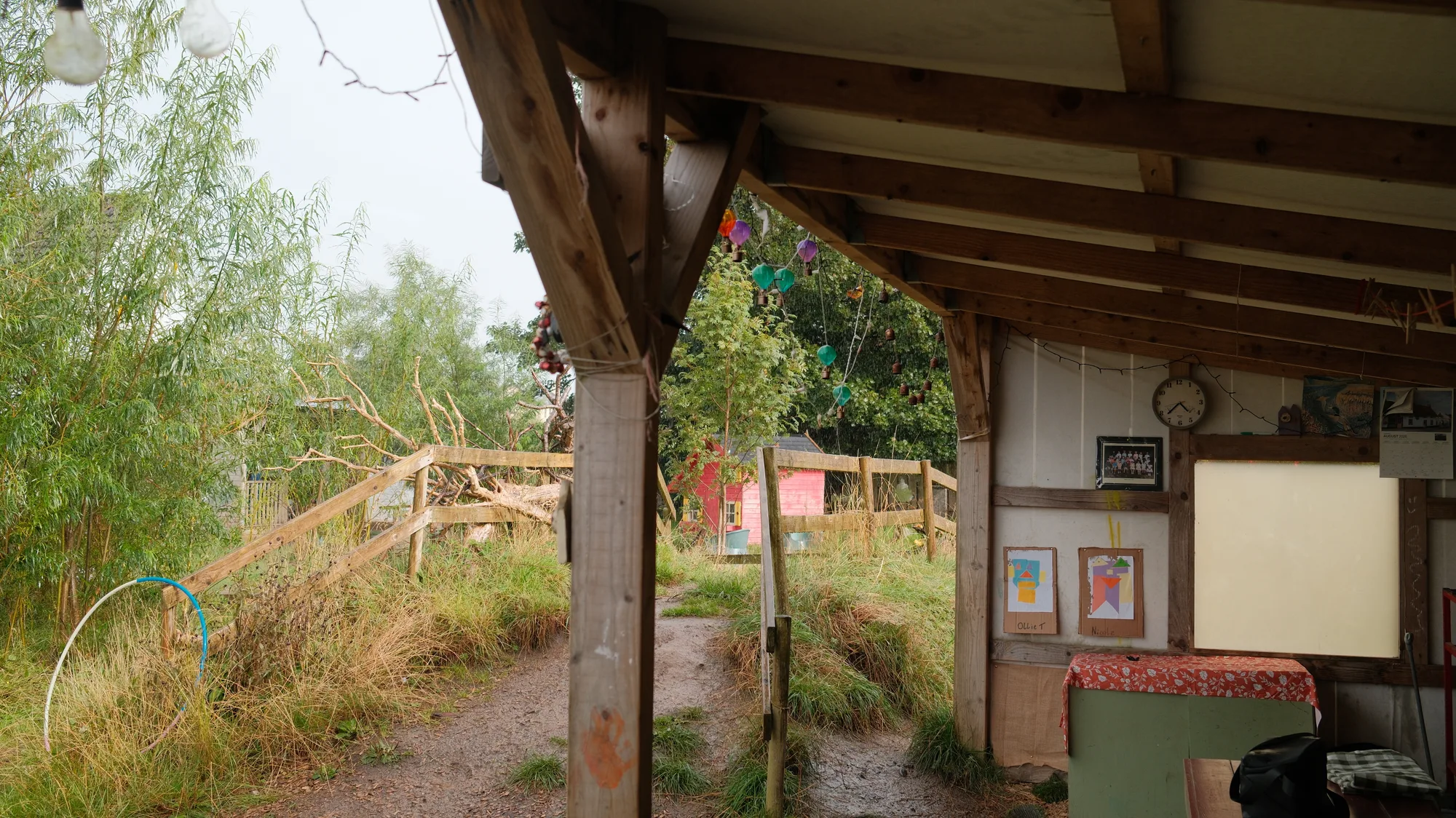The cabin doorway looking out onto the planted garden